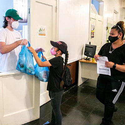 Family receiving food thanks to your support