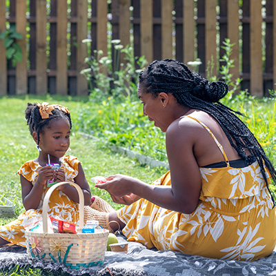 Mother having picnic with daughter